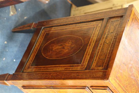 A late 18th century North Italian walnut and pictorial marquetry petit commode, W.2ft .5in. D.1ft 3.75in. H.2ft 8in.